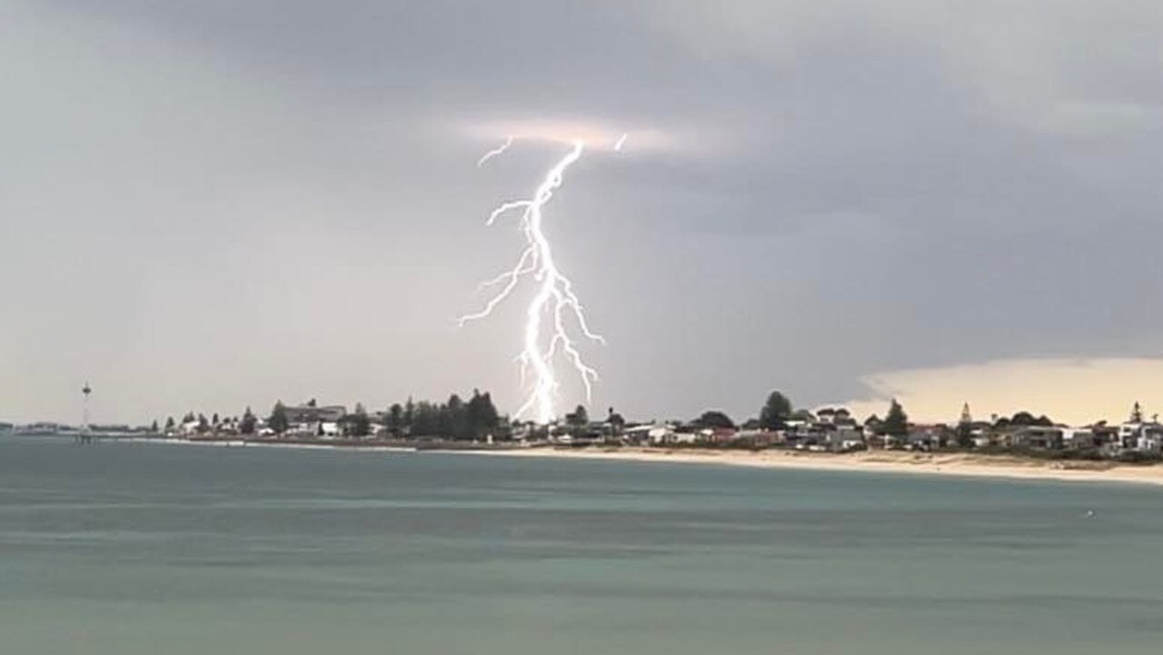 Lightning over Brighton in Adelaide. Picture: Leighton Cassebohm /Advertiser