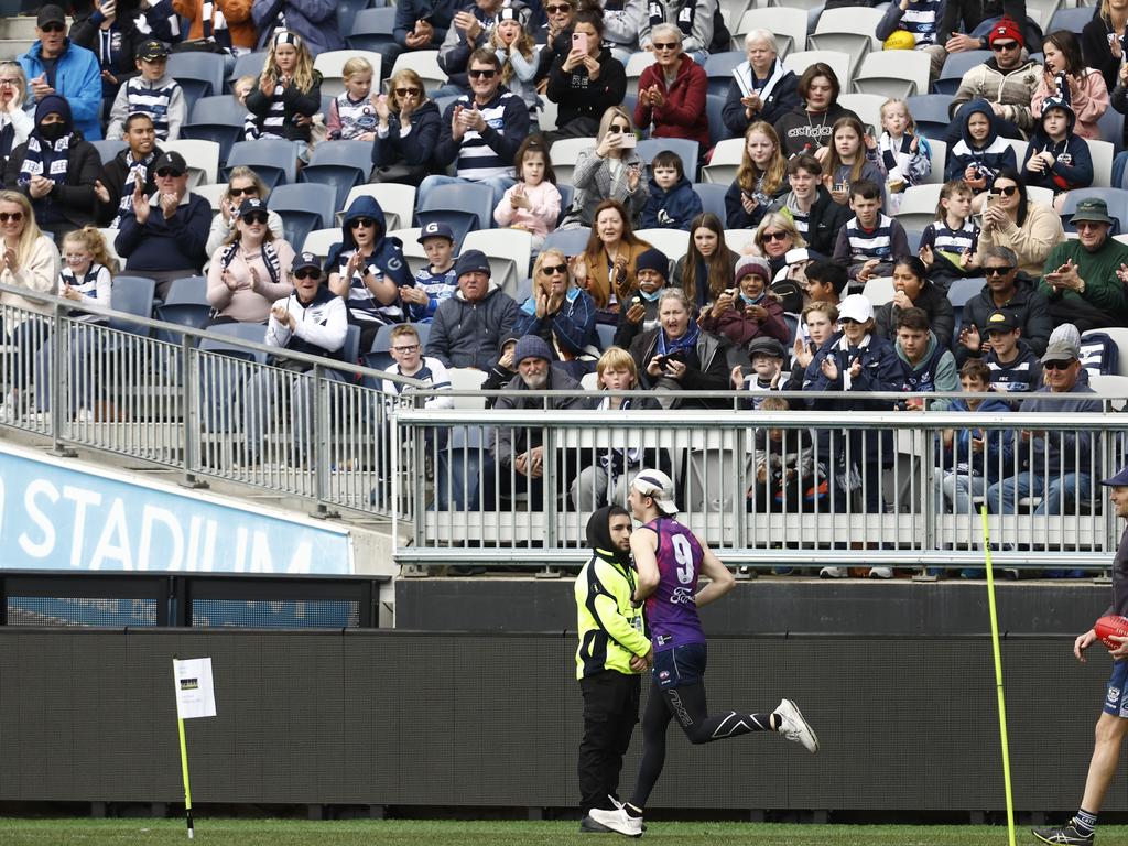 Cats fans get behind Max Holmes. Picture: Darrian Traynor/Getty Images