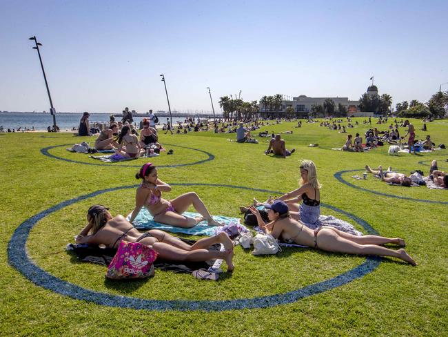 A crowded St Kilda foreshore when picnics were back on but social distancing was still a must. Picture: David Geraghty