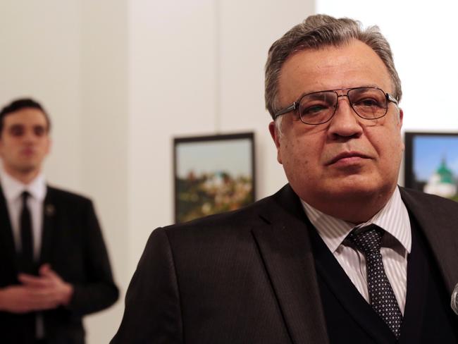 Spot News - First Prize, Stories Picture: Burhan Ozbilici, The Associated Press Title: An Assassination in Turkey Mevlüt Mert Altıntaş, a 22-year-old off-duty police officer, assassinated the Russian ambassador to Turkey, Andrey Karlov, at an art exhibition in Ankara, Turkey, on 19 December 2016. He wounded three other people before being killed by officers in a shootout. Andrei Karlov, the Russian ambassador to Turkey, speaks at an art gallery before being shot