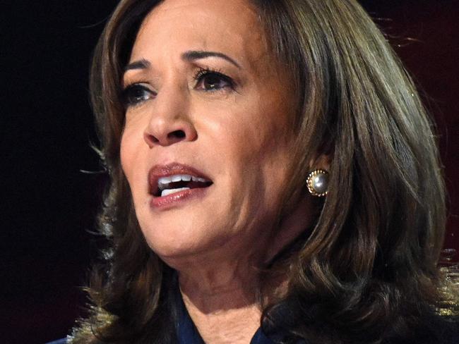 TOPSHOT - US Vice President and 2024 Democratic presidential candidate Kamala Harris speaks on the fourth and last day of the Democratic National Convention (DNC) at the United Center in Chicago, Illinois, on August 22, 2024. (Photo by SAUL LOEB / AFP)