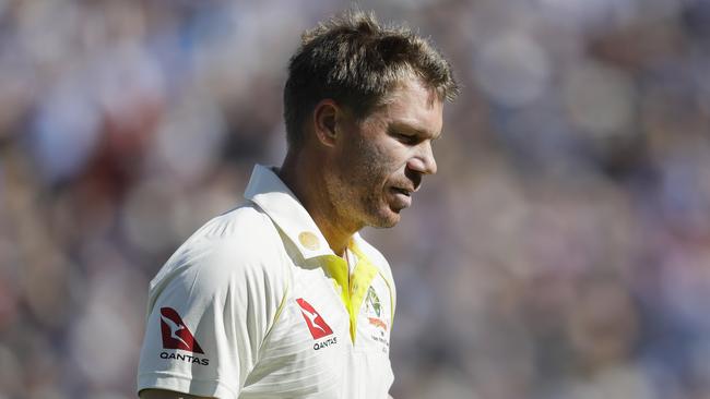 Australia's David Warner leaves the pitch after being caught by England's Jonny Bairstow off the bowling of England's Jofra Archer during the second day of the fifth Ashes test. Picture: Kirsty Wigglesworth/AP