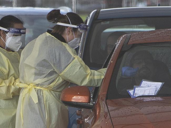 ADELAIDE, AUSTRALIA - NewsWire Photos JULY 20, 2021: Covid-19 testing coverage from the 24 hour Victoria Park Covid-19 testing station as South Australia battles to quash a potential coronavirus outbreak.Picture: NCA NewsWire / Emma Brasier