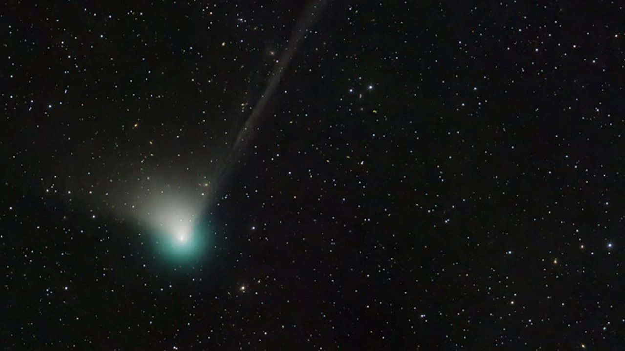 A green comet will pass over Earth, visible for the first time since Neanderthals roamed. Picture: AFP