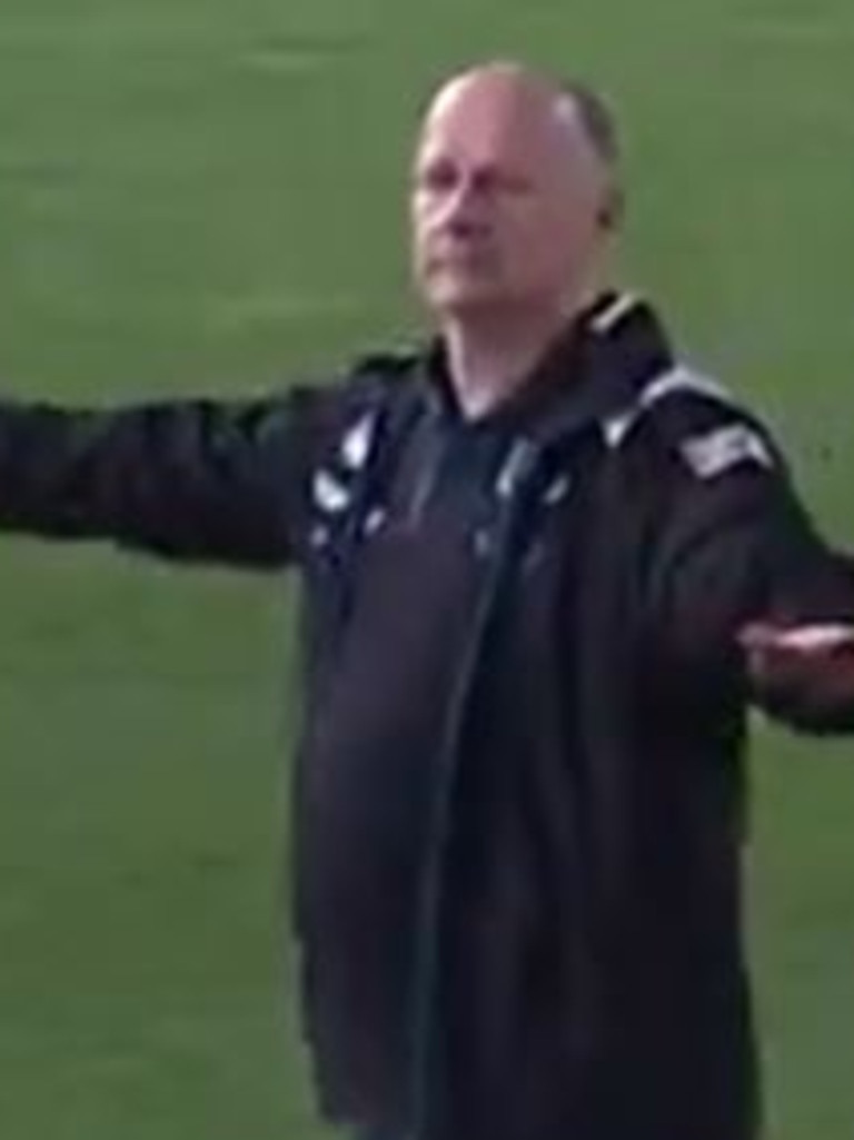 Ken Hinkley gestures to Jack Ginnivan that he won't be on a flight over this Insta reply "see u in 14 days'