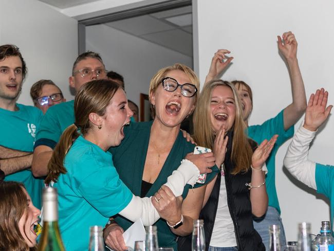 Independent Zoe Daniel, centre, celebrates as she claims the wealthy Victorian seat of Goldstein, previously held by Liberal Tim Wilson. Picture: Bernard Wright