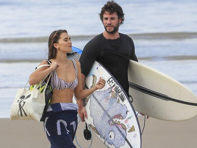 Liam Hemsworth and girlfriend, model Gabriella Brooks, joined Chris Hemsworth for the day at the beach. Picture: Media Mode