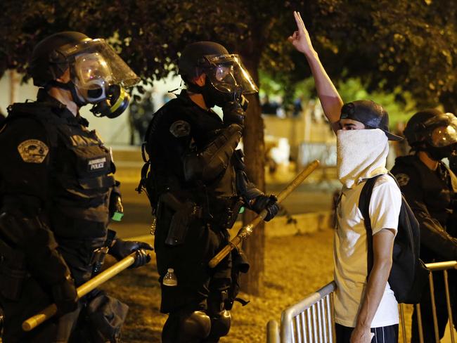 Riot police block off the Albuquerque Convention Center. Picture: Brennan Linsley