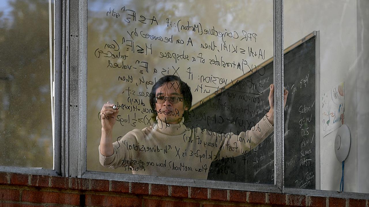 Dr Terence Tao calculating in his office at the UCLA campus in Los Angeles. Picture: Coleman-Rayner