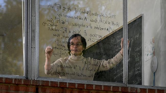 Dr Terence Tao calculating in his office at the UCLA campus in Los Angeles. Picture: Coleman-Rayner