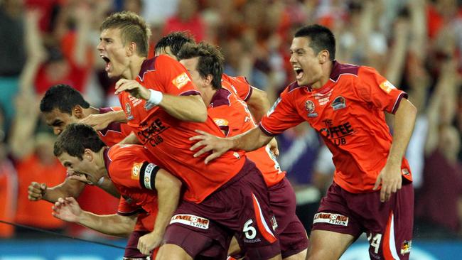 Brisbane Roar celebrate after winning an incredible 2011 A-League grand final on penalties. Picture: Nathan Richter