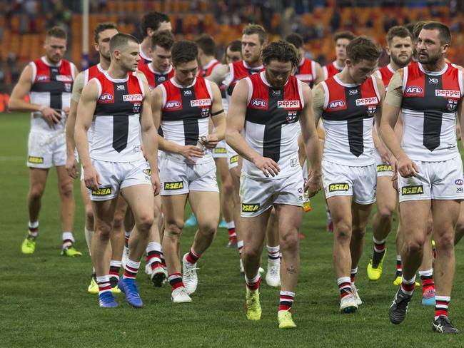 Saints laving the ground dejected after losing to GWS last week Giants (Photo: AAP/Craig Golding)