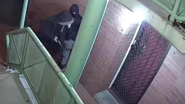 Would-be home invaders outside the Canberra unit of Glenn Walewicz, who was shot dead in a robbery attempt gone wrong. Picture: Supplied