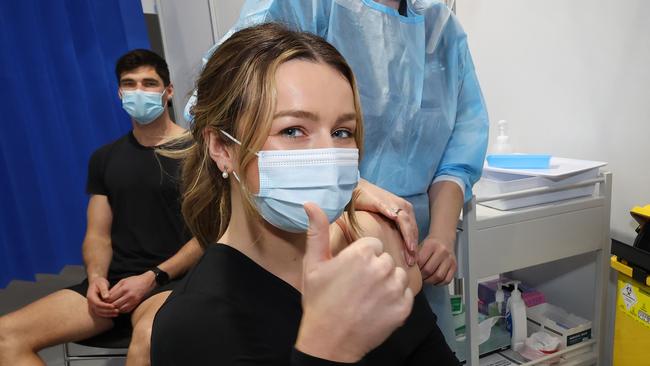 Young couple Claire Edler and Jacob Mahony received the AstraZeneca vaccine together. Picture: David Caird