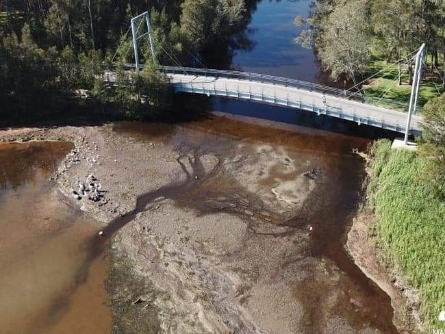 The mouth of Tumbi Creek was so badly silted up people couldn’t launch a kayak from the boat ramp let alone a boat. Picture: Shay Giblin