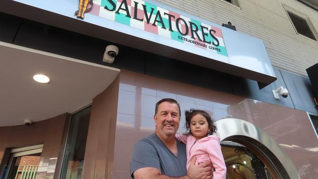 Sean Johnston the owner of Salvatore's Cafe in Darwin with his daughter Maeve.