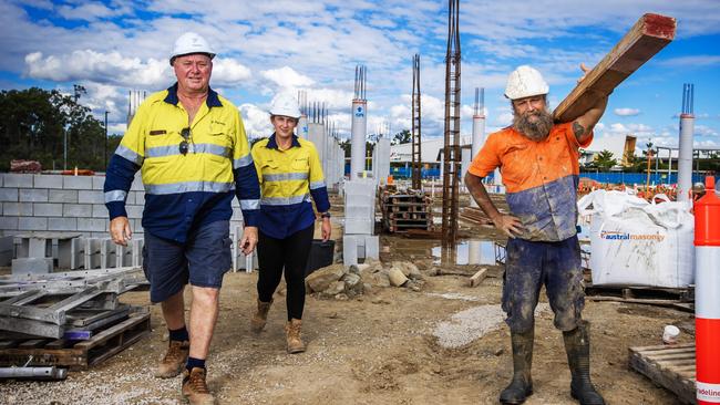 Noel Ferguson, Karly Rowe and labourer Kurt McLean. The construction industry is facing a worker shortage. Picture: Nigel Hallett