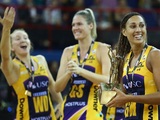 BRISBANE, AUSTRALIA - JUNE 17:  Geva Mentor, captain of the Sunshine Coast Lightning holds the Suncorp Super Netball trophy aloft after winning the Super Netball Grand Final match between the Lightning and the Giants at the Brisbane Entertainment Centre on June 17, 2017 in Brisbane, Australia.  (Photo by Scott Barbour/Getty Images)