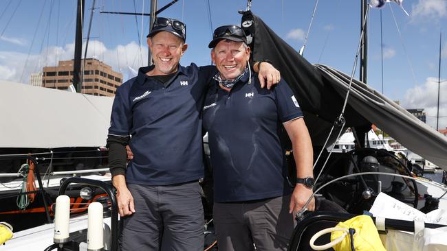 Crew member Shayne Hansen with skipper Andrew Jones of yacht AdvantEdge from Tasmania after they finished the Sydney to Hobart 2023. Picture: Nikki Davis-Jones