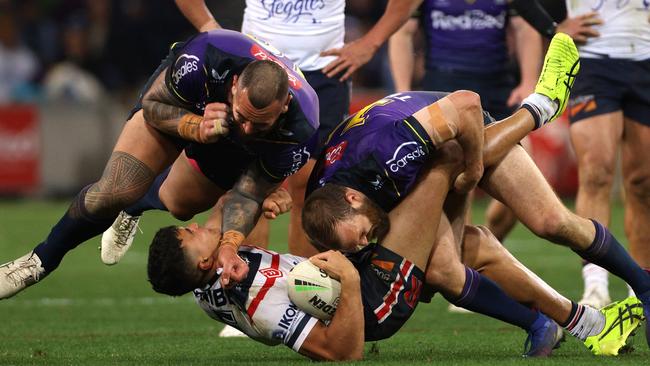 Asofa-Solomona about to drop on Suaalii. NRL Imagery