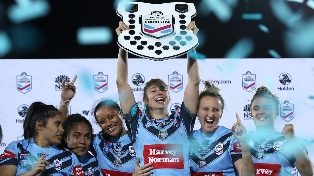 New South Wales celebrate victory in the Women's State of Origin match.