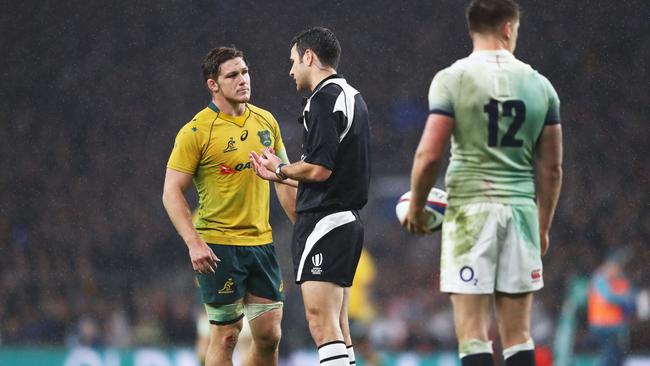 Ben O’Keeffe explains his decision to award a penalty to England to Wallabies captain Michael Hooper.