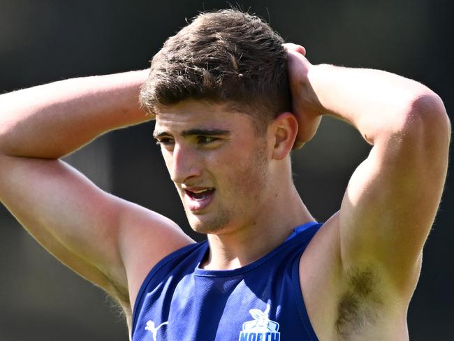 MELBOURNE, AUSTRALIA - NOVEMBER 17: Harry Sheezel of the kangaroos catches his breath during a North Melbourne Kangaroos AFL training session at Arden Street Ground on November 17, 2023 in Melbourne, Australia. (Photo by Quinn Rooney/Getty Images)