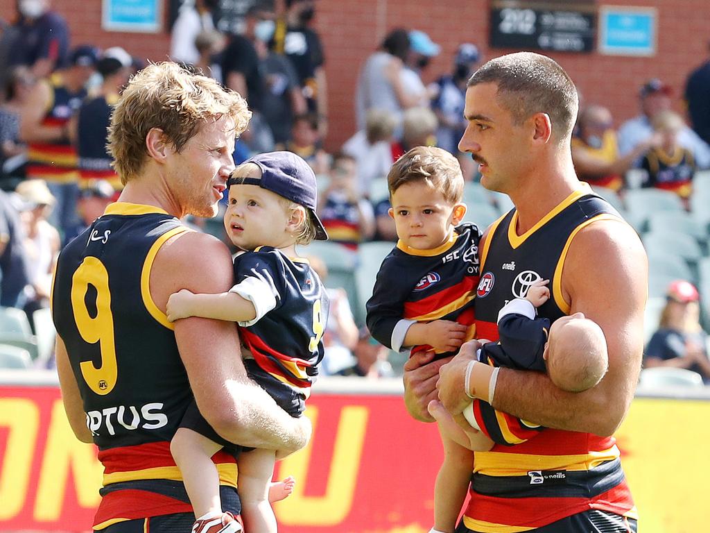 Sloane and Walker with their boys before the clash with Geelong.