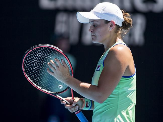 MELBOURNE, VIC - JANUARY 30: Ashleigh Barty of Australia straightens the strings in her racquet during the semifinals of the 2020 Australian Open on January 30 2020, at Melbourne Park in Melbourne, Australia. (Photo by Jason Heidrich/Icon Sportswire via Getty Images)