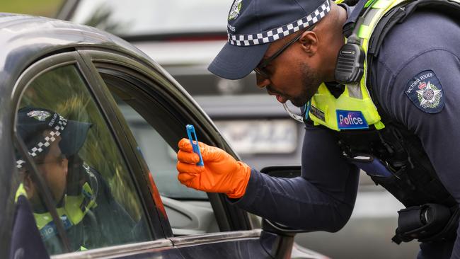 Victoria Police pull over drivers at a roadside drug and alcohol testing site in Southbank, as part of Operation Roadwise in the lead up to Christmas. Picture: NCA NewsWire / Ian Currie