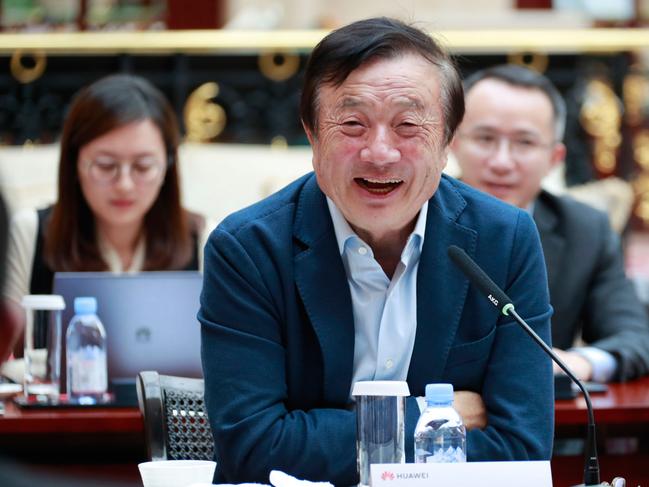 (FILES) This file handout taken on January 17, 2019 and released by Chinese tech giant Huawei shows Huawei founder Ren Zhengfei (C) speaking to the Chinese media in Shenzhen in China's southern Guangdong province. - Huawei founder Ren Zhengfei survived food shortages during China's Cultural Revolution, but now the reclusive billionaire identified as "Individual-1" in a US indictment faces an existential fight for his family and company. (Photo by HANDOUT / HUAWEI / AFP) / -----EDITORS NOTE --- RESTRICTED TO EDITORIAL USE - MANDATORY CREDIT "AFP PHOTO / HUAWEI" - NO MARKETING - NO ADVERTISING CAMPAIGNS - DISTRIBUTED AS A SERVICE TO CLIENTS - NO ARCHIVES  TO GO WITH China-US-telecom-diplomacy-Huawei-Ren, PROFILE by Ryan MCMORROW /