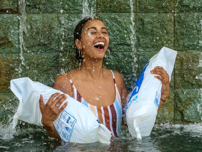 Emily Vintour finds one way you can cool down in the Top End at the moment. Picture: Glenn Campbell