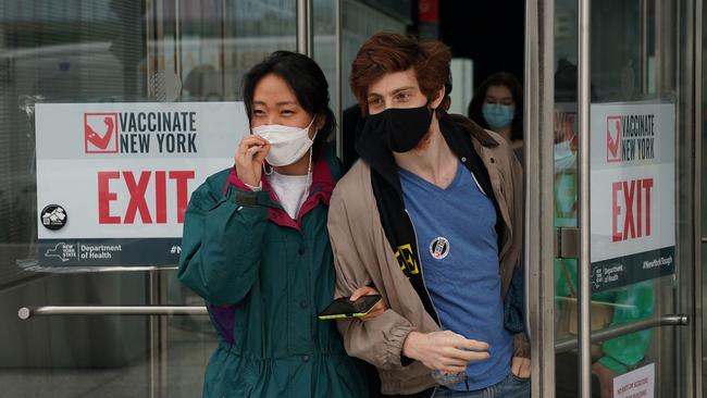 People leave after receiving their vaccine at the Javits Center COVID-19 vaccination centre in New York. Picture: AFP