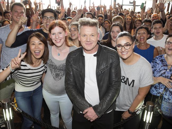 Gordon Ramsay poses for a photo with fans. Picture: Sarah Matray