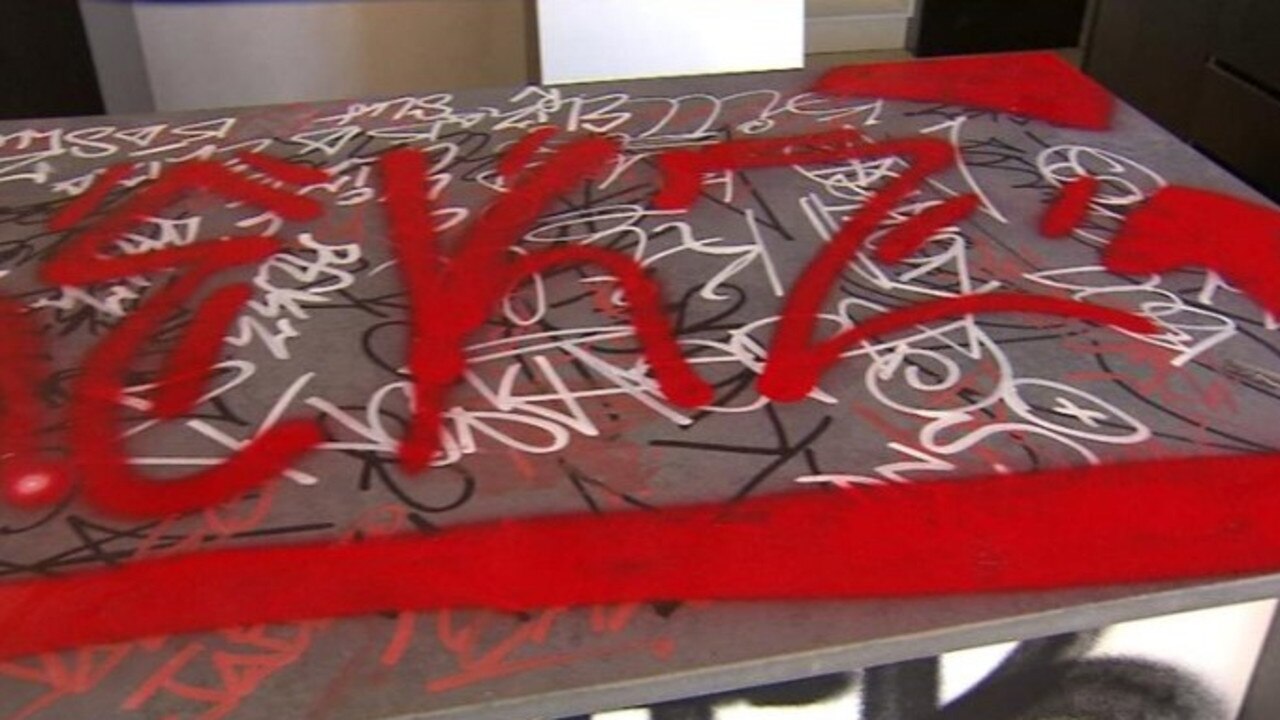 The bench top is covered in spray paint. Picture: 7 NEWS