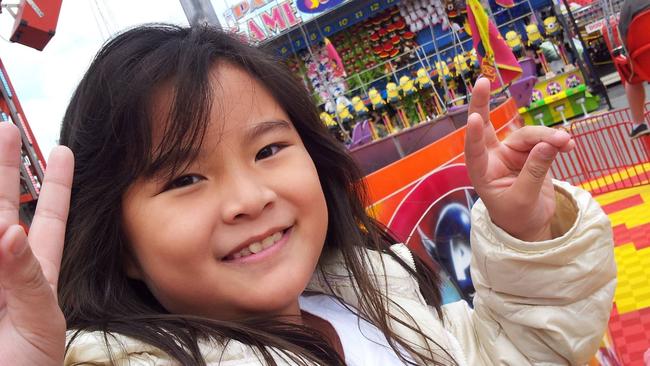 Police today released this photograph – selected by her mother - of Malaysian national Adelene Leong . Adelene died after falling from the Airmaxx 360 ride at the Royal Adelaide Show 2014 . Source SAPOL