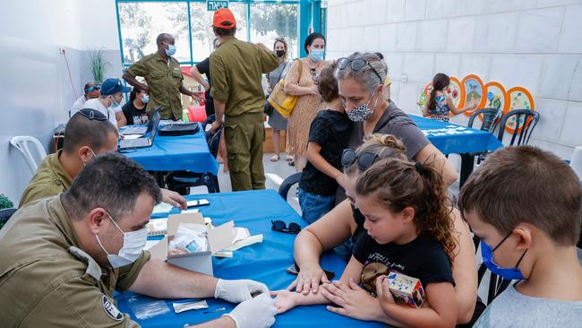 Israeli children undergo Covid-19 testing in Netanya on Sunday. Picture: AFP