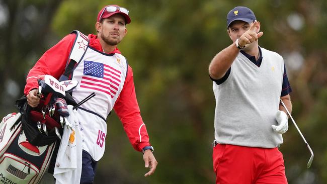 Karain was banned as Patrick Reed’s caddie following the incident.