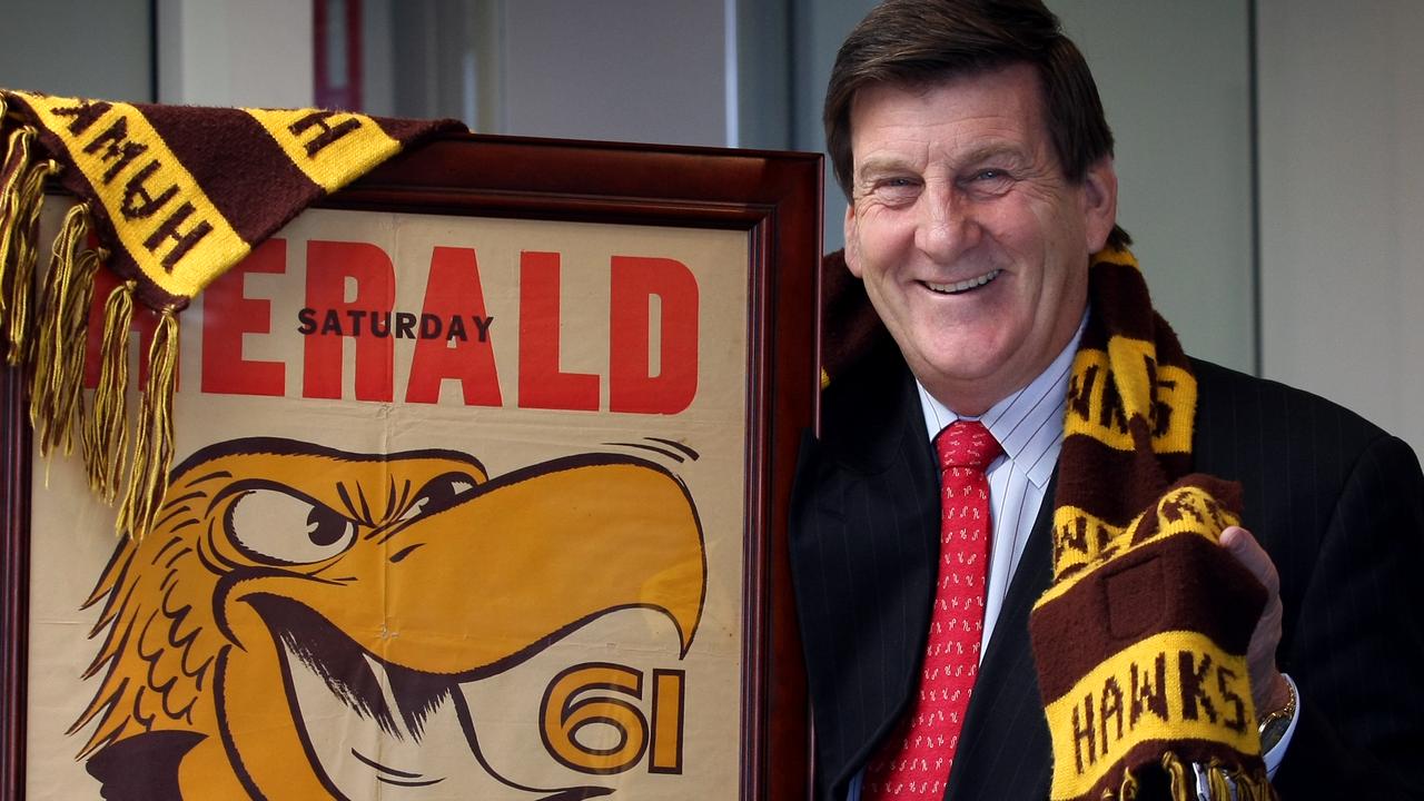 Jeff Kennett barracked for the Hawks from a very young age despite his parents following Melbourne. Here he is with a poster from the Hawks’ 1961 grand final win.