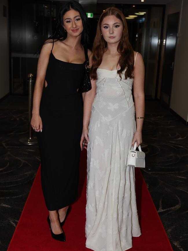 MELBOURNE, AUSTRALIA – JUNE 14 2024 Bella Ainsworth and Kayla Lelievre attend the Lowanna College Senior Formal 2024 at the Moe Racing Club Picture: Brendan Beckett