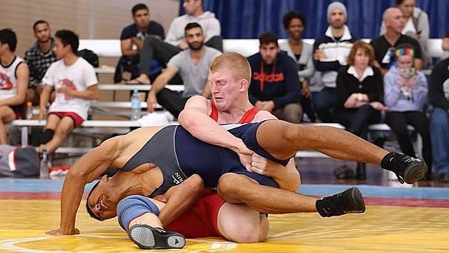 Jayden Lawrence, of Catherine Field, wins at the Australian wrestling championships, also