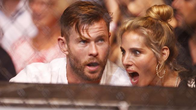 Chris Hemsworth and wife Elsa Pataky react while watching the UFC 234 undercard fight between Teruto Ishihara and Kyung Ho Kang. Picture: AAP Image/Daniel Pockett