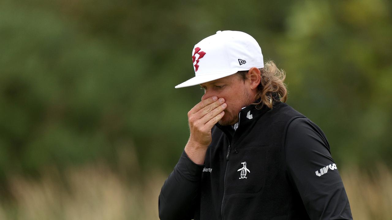 TROON, SCOTLAND - JULY 18: Cameron Smith of Australia reacts to a missed birdie putt on the 11th green on day one of The 152nd Open championship at Royal Troon on July 18, 2024 in Troon, Scotland. (Photo by Harry How/Getty Images)