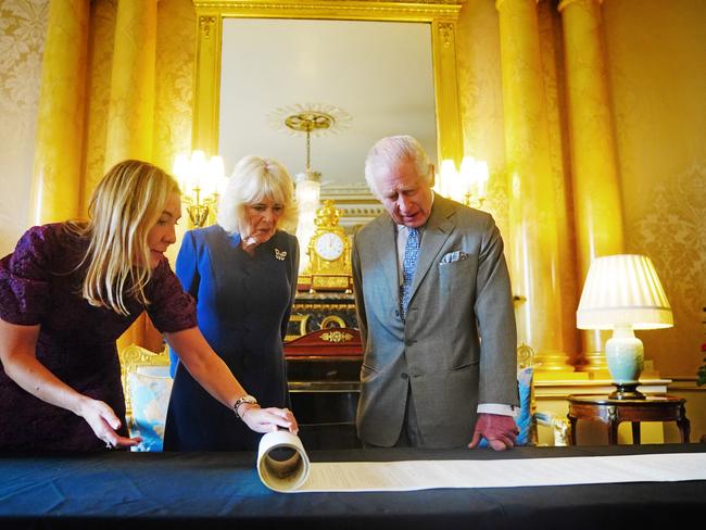 King Charles III and Queen Camilla are presented with the Coronation Roll. Picture: Getty Images