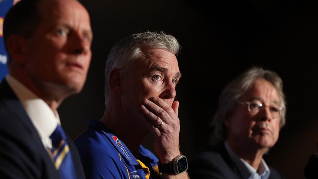 PERTH, AUSTRALIA - JULY 09: Adam Simpson looks on with Don Pyke (WCE CEO) and Paul Fitzpatrick (WCE Chair) after the West Coast Eagles and senior coach Adam Simpson mutually agreed that his 11-year tenure at the club will come to an end during a West Coast Eagles AFL press conference at Mineral Resources Park on July 09, 2024 in Perth, Australia. (Photo by Paul Kane/Getty Images)