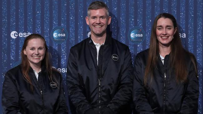 From left, Meganne Christian, John McFall and Rosemary Coogan at the European Space Agency in Paris. Picture: AFP.