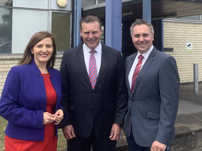 Tania Mihailuk (l) with Cameron Murphy (c) and Guy Zangari (r), outside Revesby Police station.