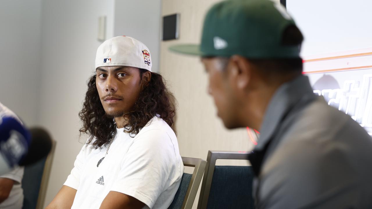 Luai and his father Martin Luai at the press conference where he announced his move to the Tigers. Picture: Richard Dobson