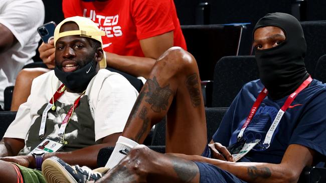 US basketballers Draymond Green, left, and Kevin Durant Green were among the spectators at the women’s basketball quarter final. Picture: Reuters