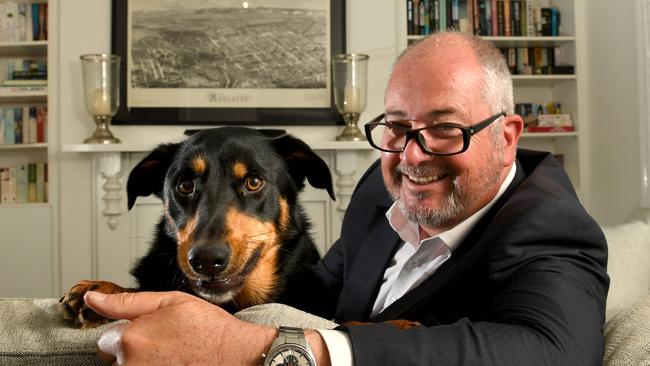 Leon Bignell at home with his KI rescue dog Dusty. Picture: Tricia Watkinson